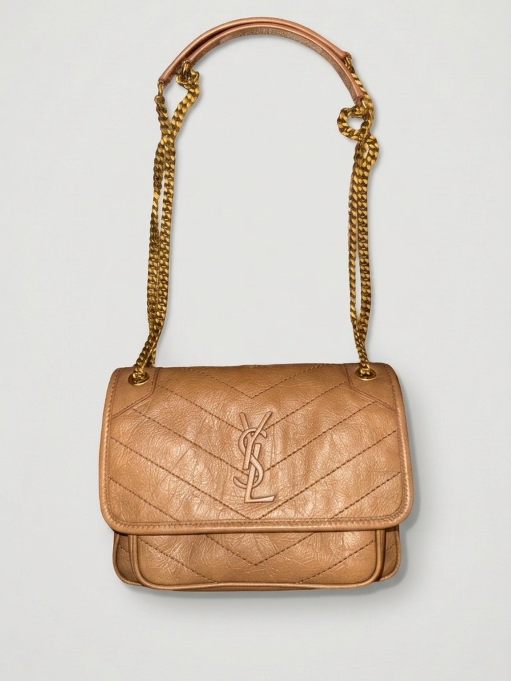 Saint Laurent
Niki Small brown crinkled leather shoulder bag
$3,100